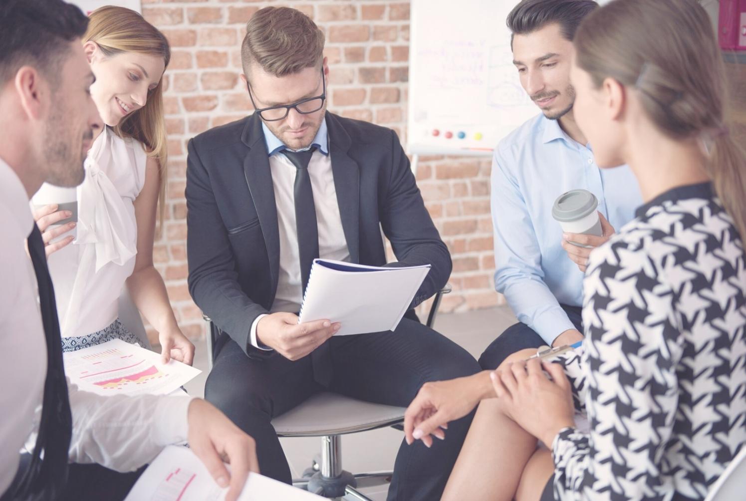 Financial analyst reviewing business forecasts and model assumptions