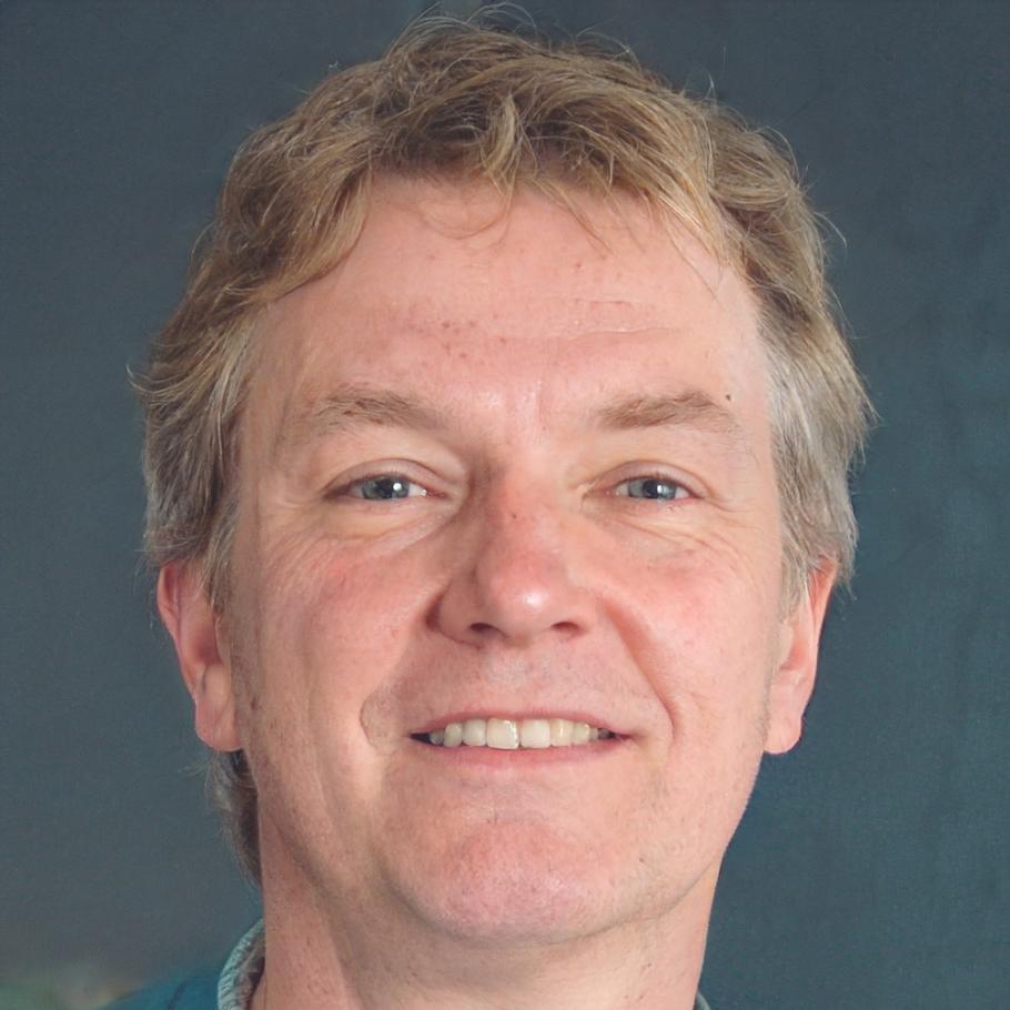 Jasper Holgersen working on financial analysis at his desk